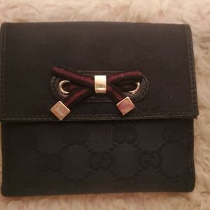 Authentic black canvas & leather bow wallet